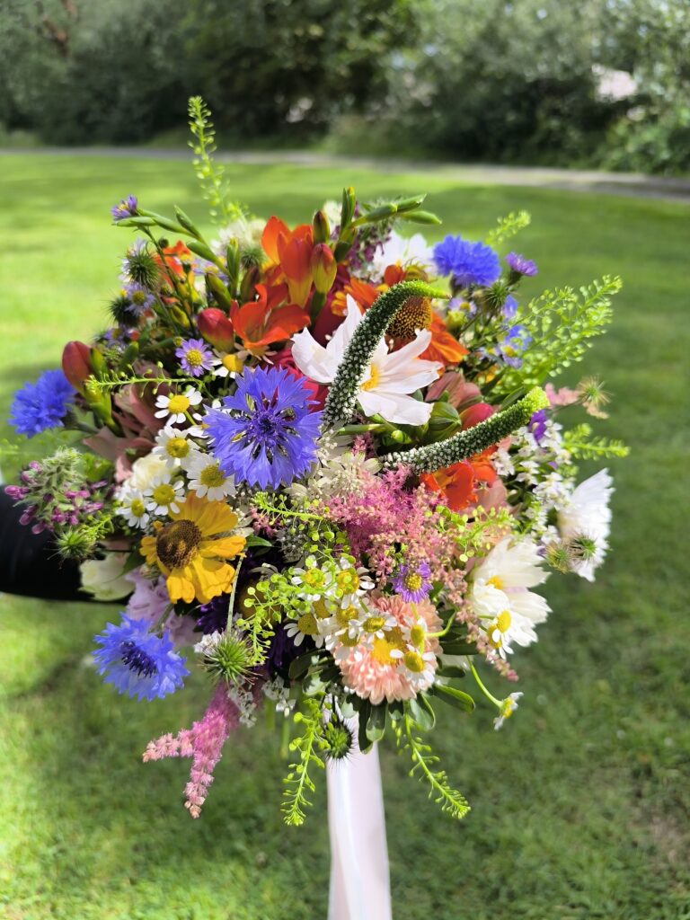 Colourful wildflower bridal bouquet at Martinstown House, Kildare
