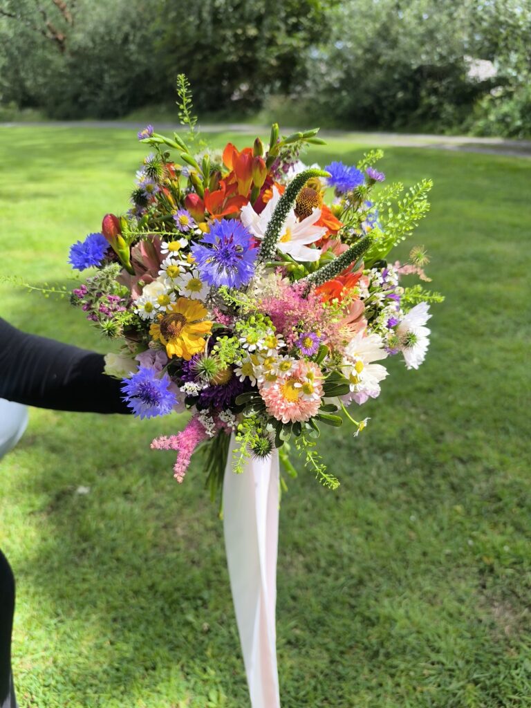Colourful wildflower bridal bouquet at Martinstown House, Kildare
