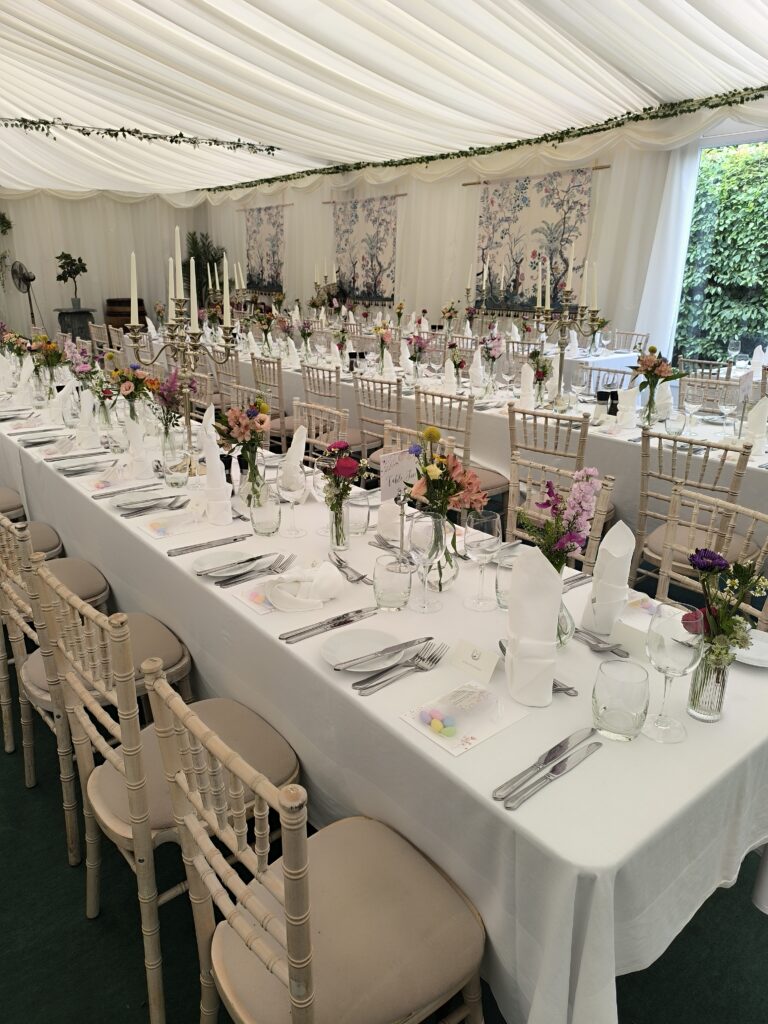 Colourful long table wedding reception at Martinstown House, Kildare